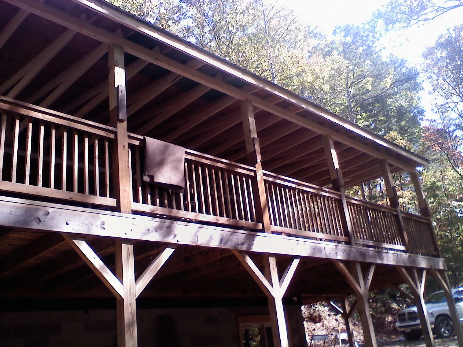 Timber framing under a new elevated porch and deck — Roof Leak Repair in Buckhead by Roofing Brothers